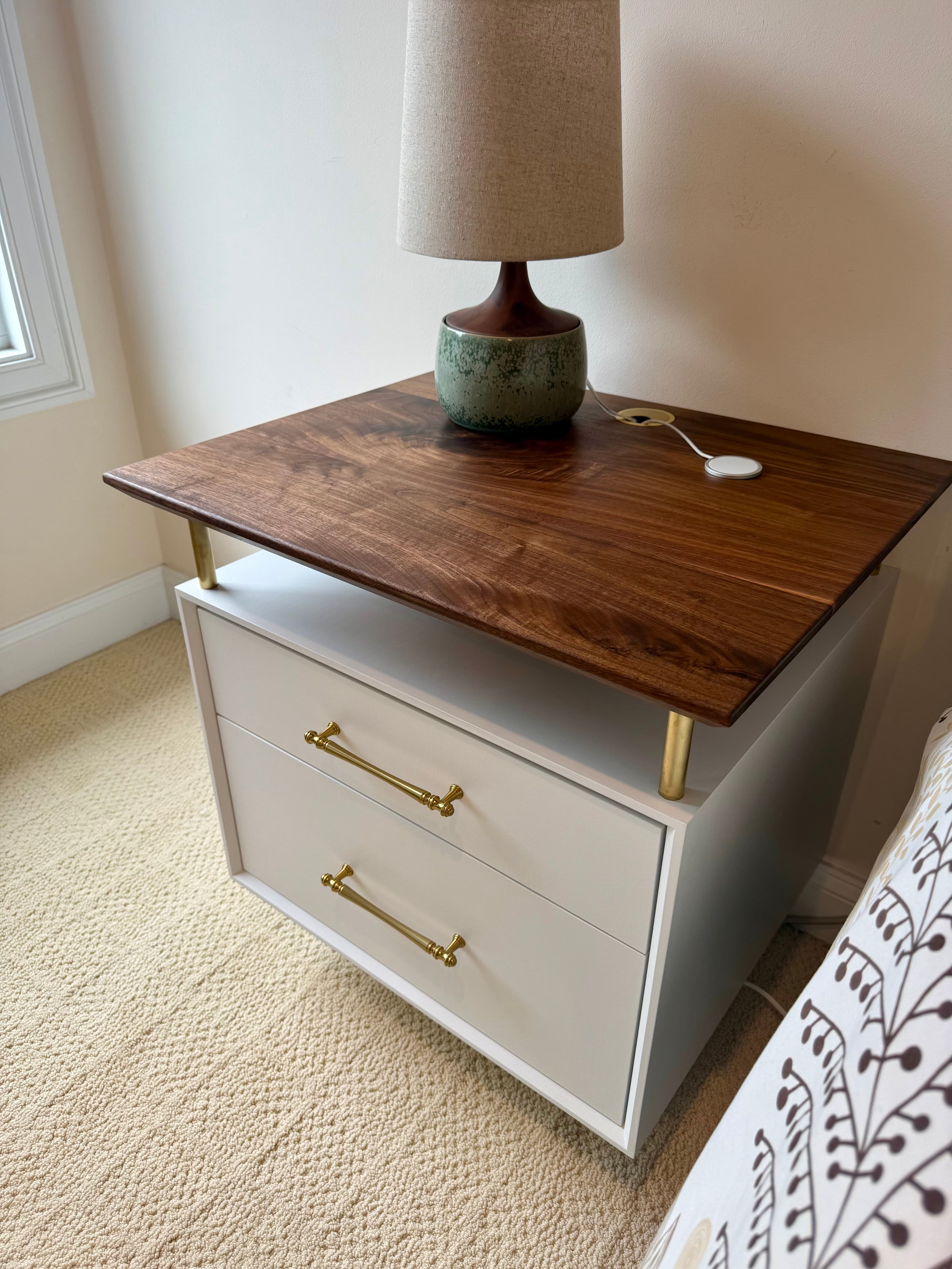 Custom walnut nightstand with brass accents